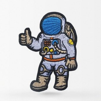 Parche de astronauta con pulgar arriba